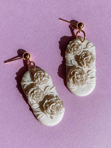 Long Floral Dangles in Pearlescent White